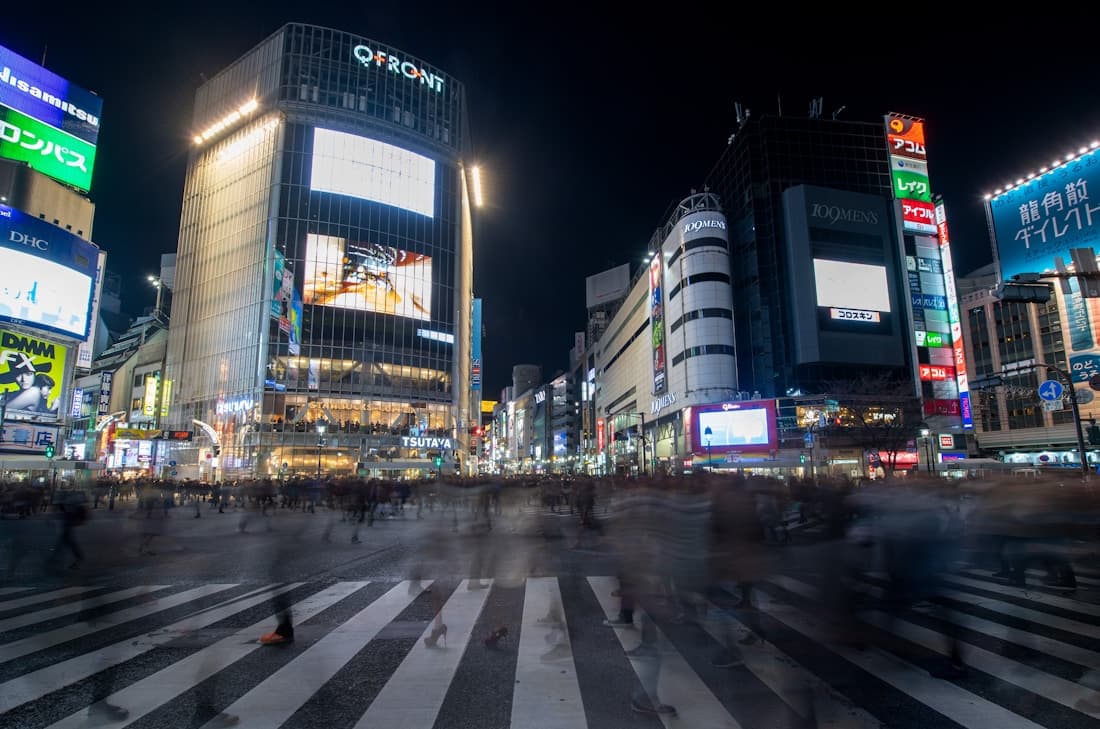 Neon-lit streets at Shibuya Crossing in Tokyo